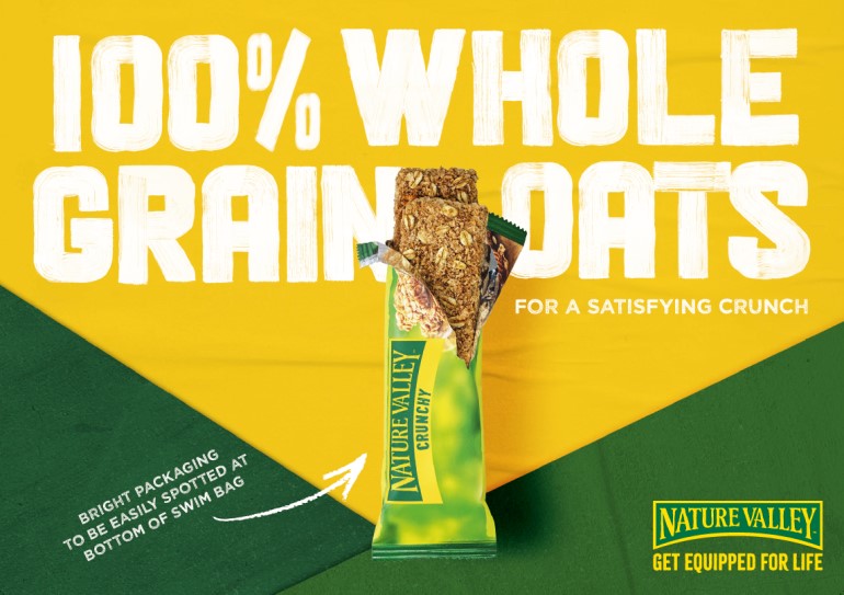 banner of 100% whole grain oats with nature valley bar on it.